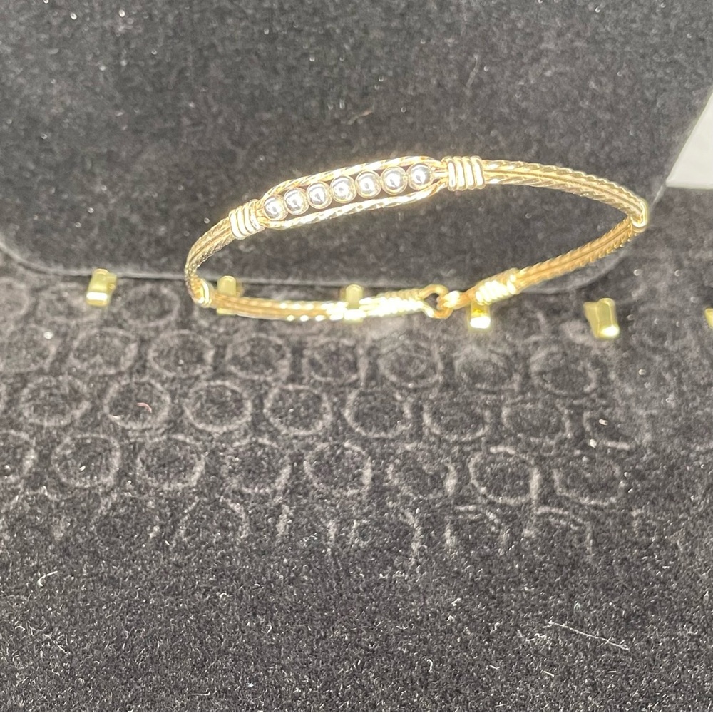 The Power of Prayer 
Ronaldo Jewelry
